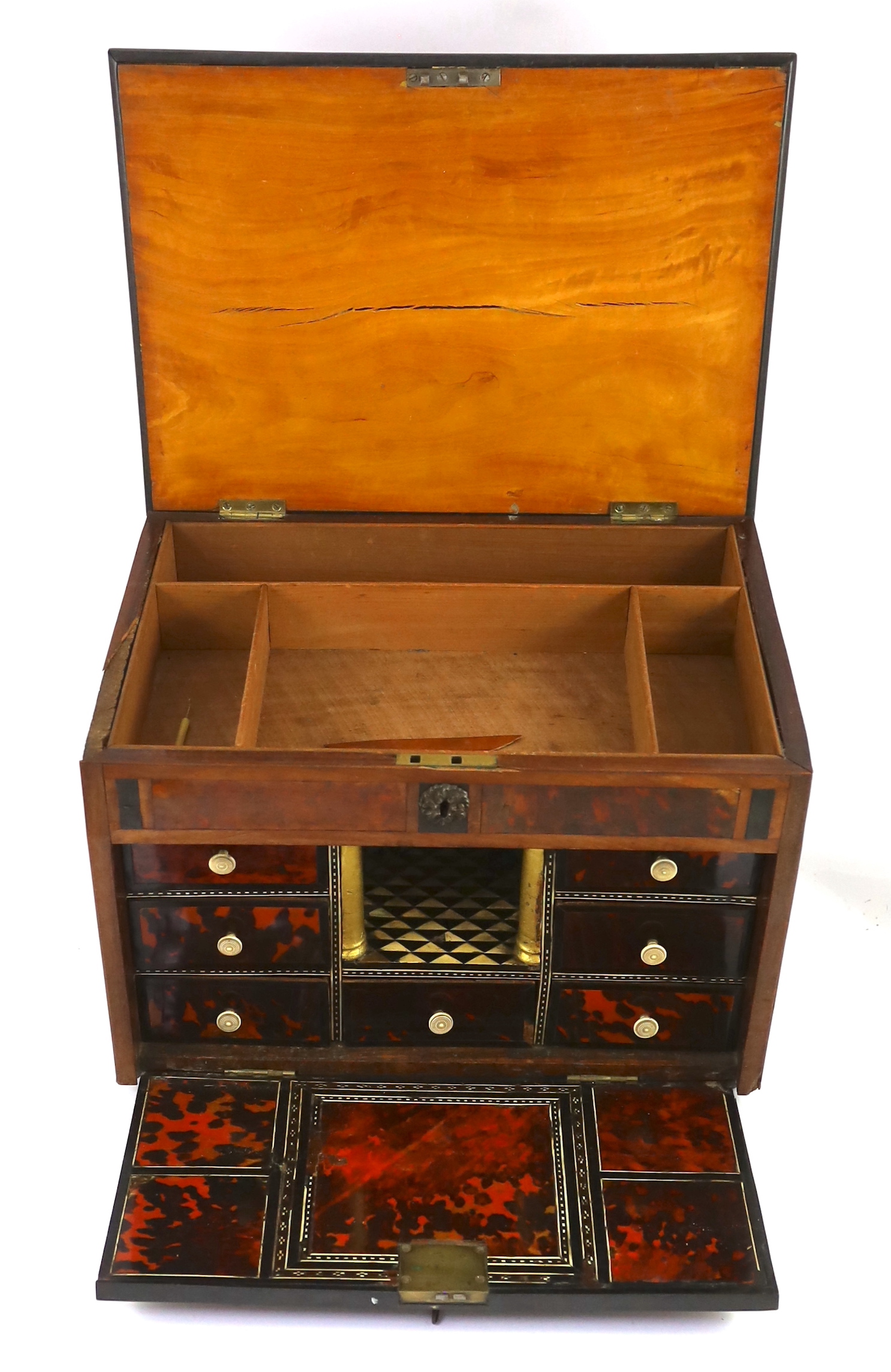 An early 18th century Indo Portuguese ebony, satinwood and red tortoiseshell travelling case, 42cm wide, 30cm deep, 29cm high. Ivory submission reference: YHDD1FSF